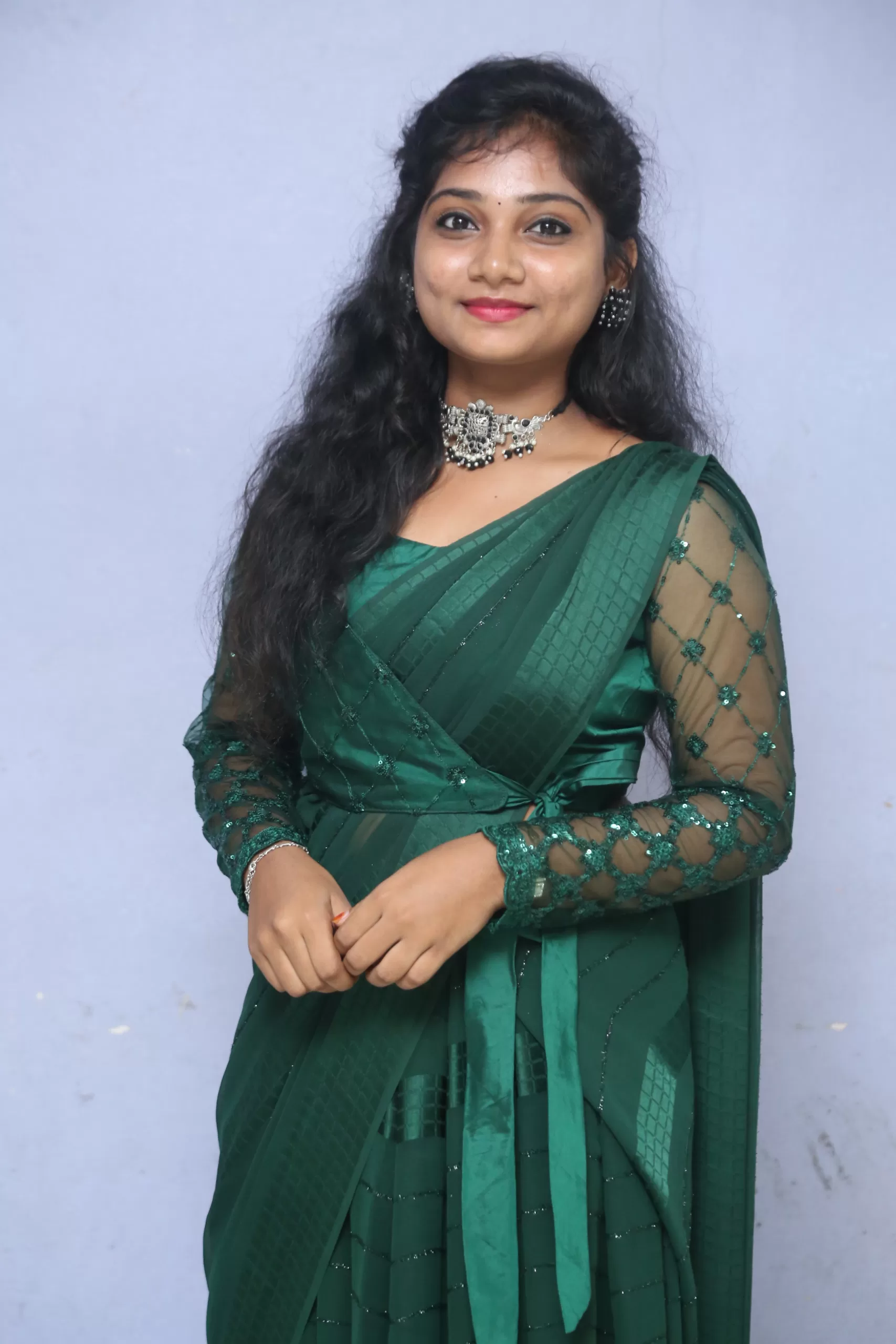 Tollywood Actress Lakshmi Priya’s stunning photoshoot stills captured at the Kaveri Movie Pre-Release Event